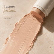 Texture teintée fondante du Stick Solaire Visage SPF50 Teinté HOLIAĒ en macro