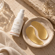 Routine Duo Contour des Yeux Anti-Rides HOLIAĒ en mise en scène éditoriale sur travertin