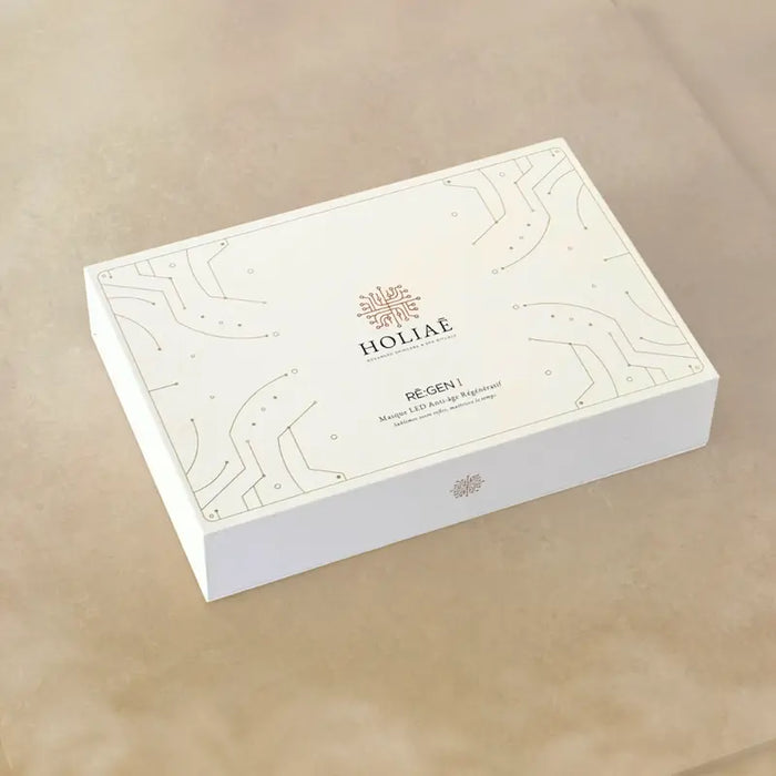 Coffret luxe Holiae RE:GEN I contenant le masque LED visage anti-âge et ses accessoires