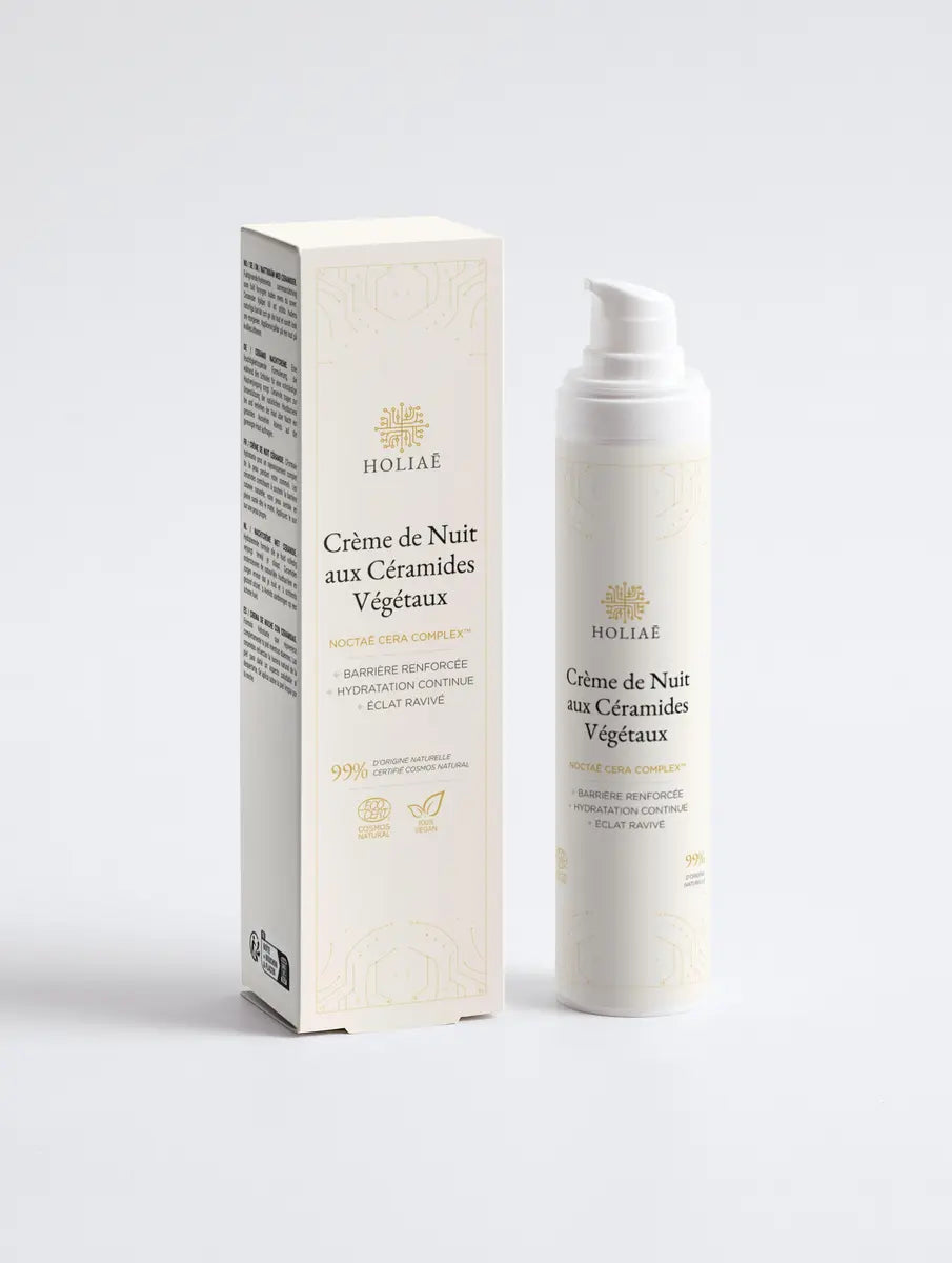 Crème de nuit anti âge Holiaē avec étui, présentée sur fond blanc, version packshot premium.