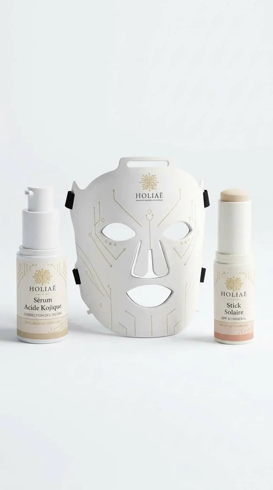 Cure LED ciblée anti-taches combinant masque LED et soins essentiels pour améliorer l’uniformité et la régularité du teint.