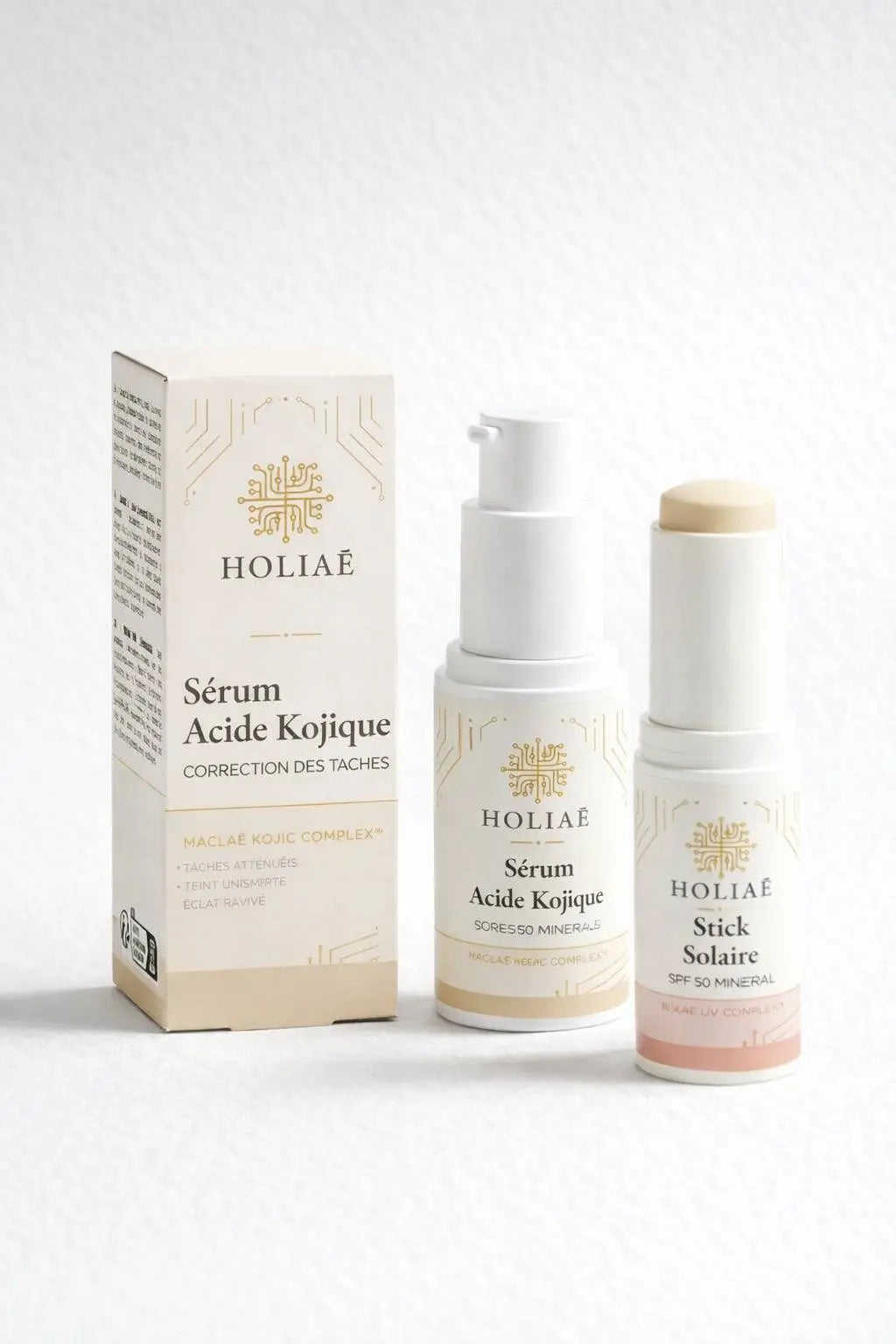 Duo de soins visage anti-taches pour améliorer l’uniformité du teint, composé d’un sérum ciblé et d’un soin protecteur.