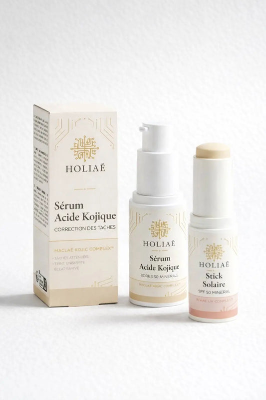 Duo de soins visage anti-taches pour améliorer l’uniformité du teint, composé d’un sérum ciblé et d’un soin protecteur.
