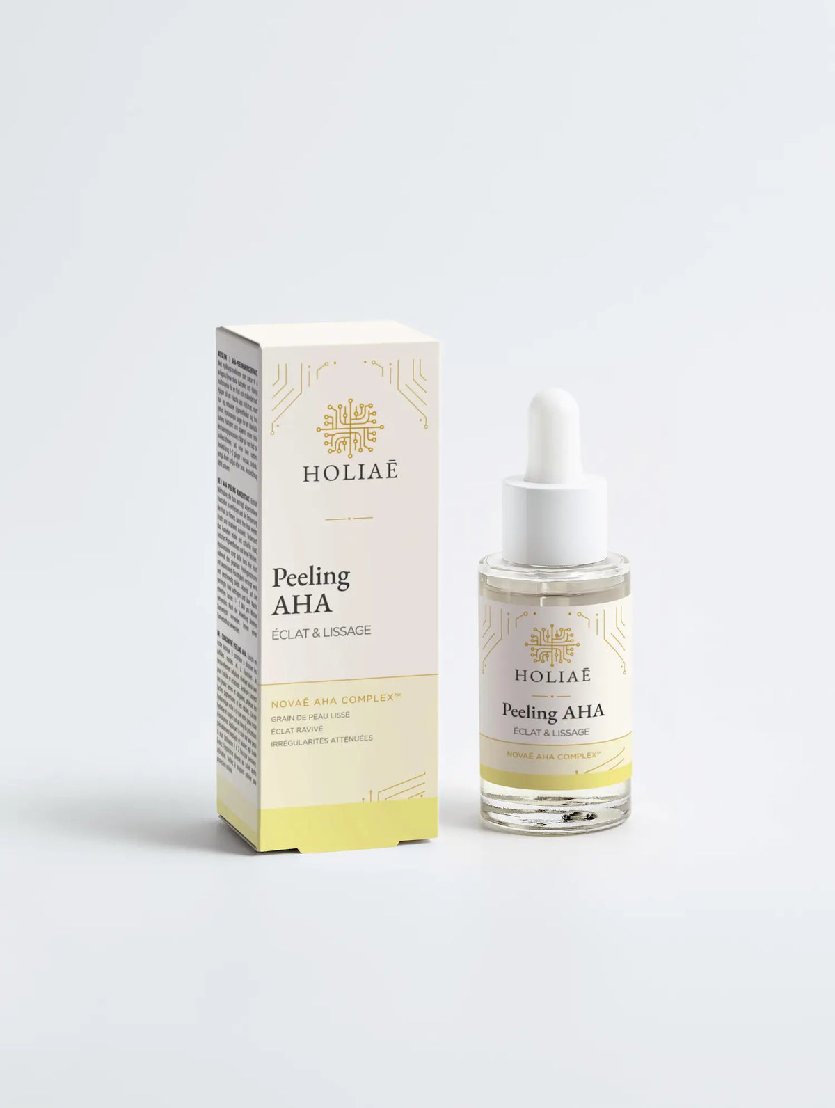 Peeling visage AHA Holiaē Novaē posé devant son étui, sur fond clair, soin exfoliant lactique 10%.