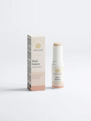 Stick solaire Holiaē SPF50 avec packaging sur fond blanc, format nomade et protection minérale